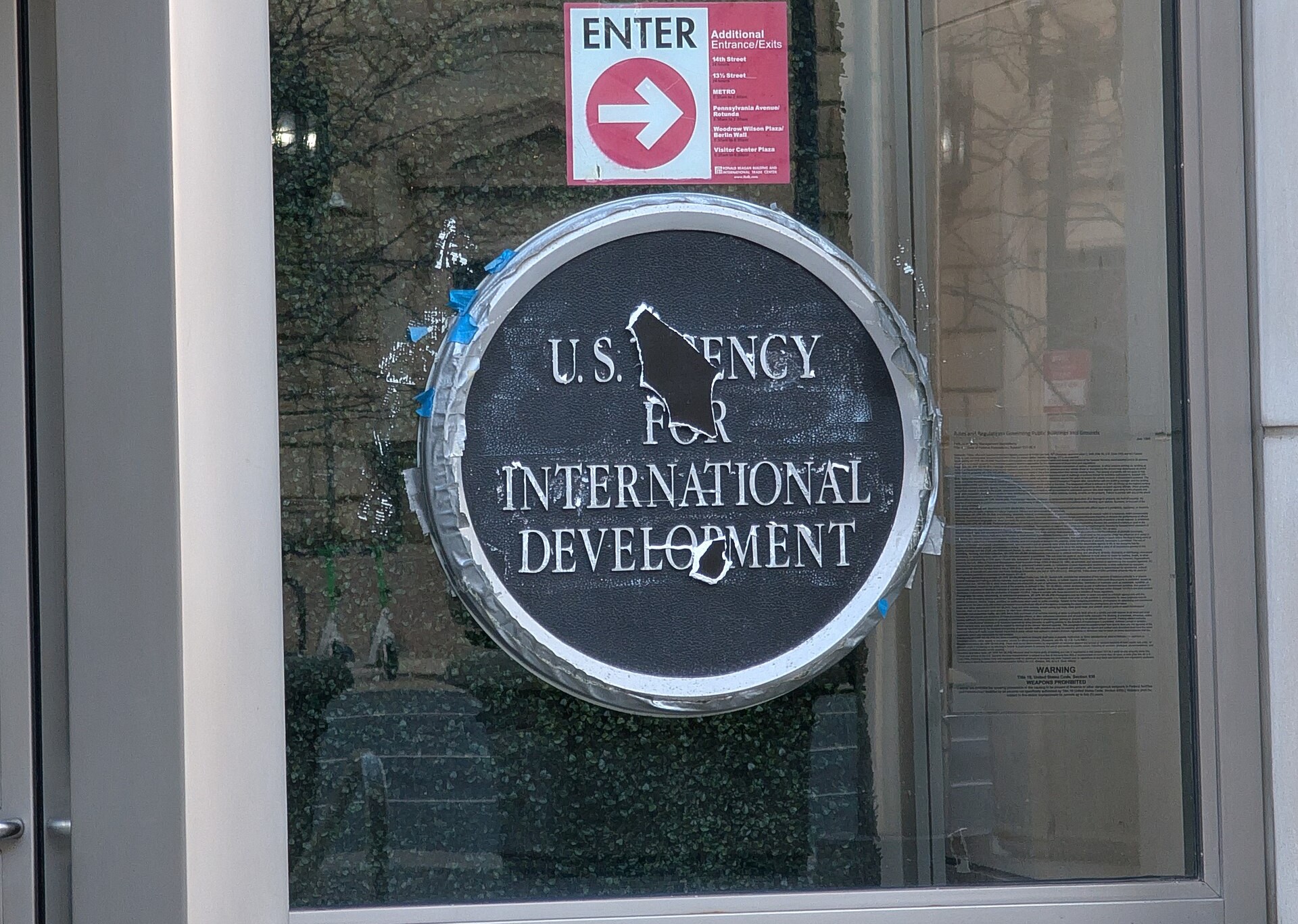 US-AID window sign after being uncovered, Washington, DC